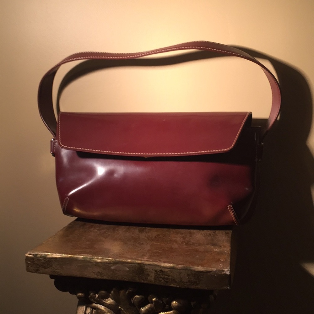 Fun red mini satchel! Used. Lots of stitching.